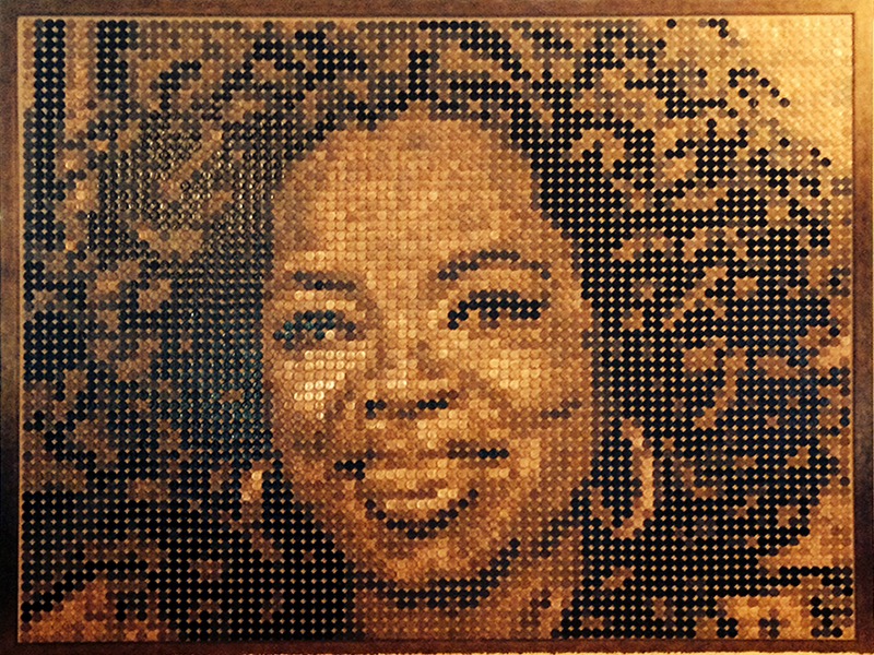 Portrait of Oprah Winfrey made from 4900 pennies