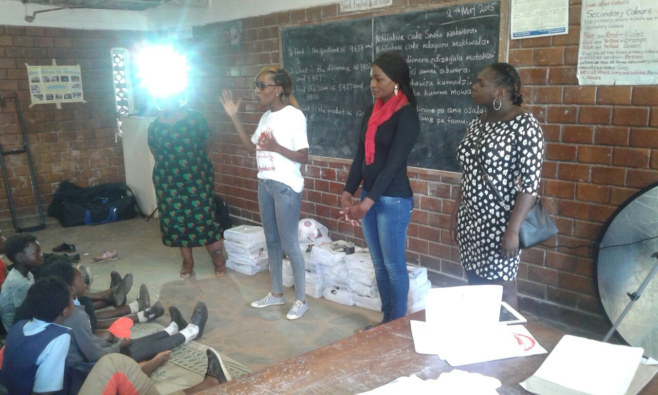 Thankful Thinking making the donation to Mulele Mwana Community School, Lusaka,Zambia