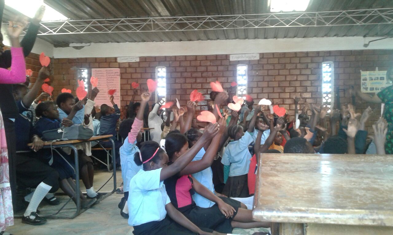 Mulele Mwana Community School children being students with heart.