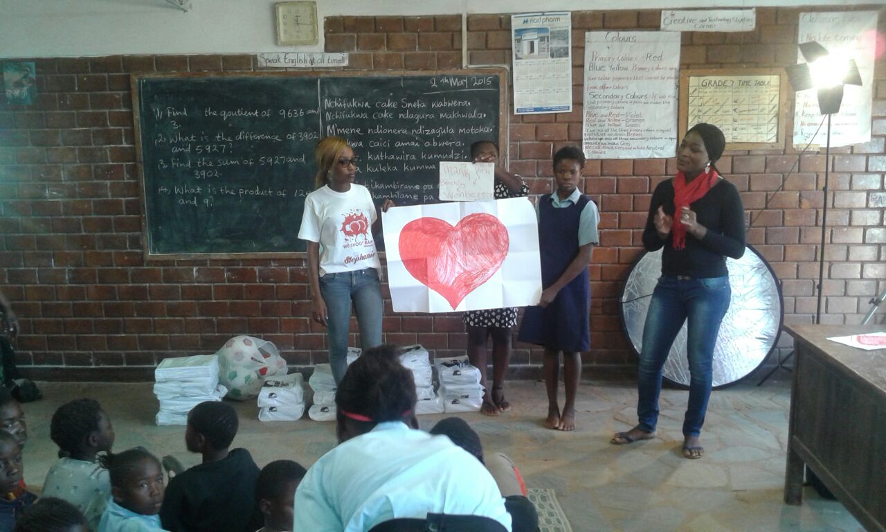 Thankful Thinking making the donation to Mulele Mwana Community School, Lusaka,Zambia