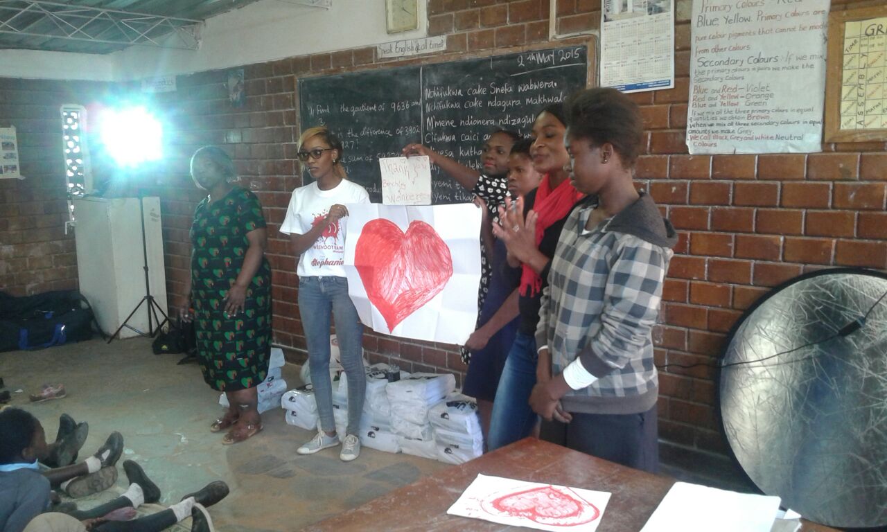 Thankful Thinking making the donation to Mulele Mwana Community School, Lusaka,Zambia