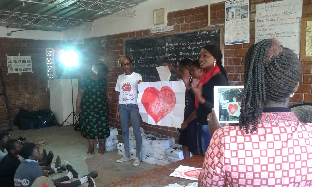 Thankful Thinking making the donation to Mulele Mwana Community School, Lusaka,Zambia