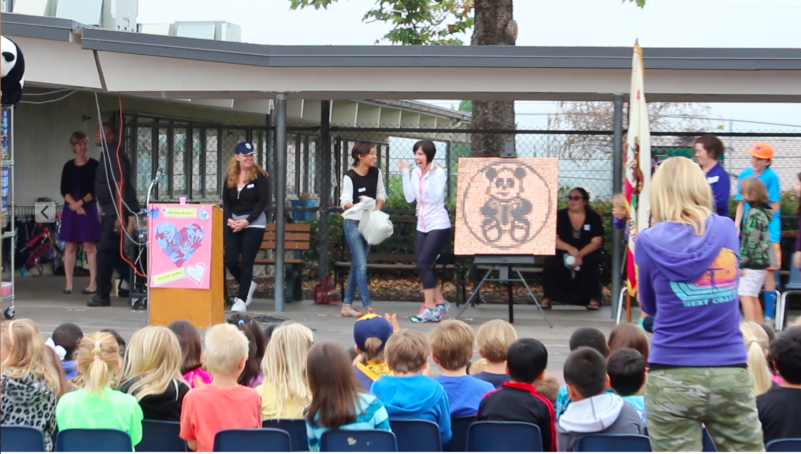 Presenting Panda Penny Mural as a thank you to Benchley Weinberger.