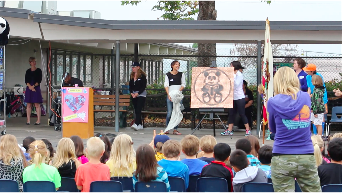 Presenting Panda Penny Mural as a thank you to Benchley Weinberger.