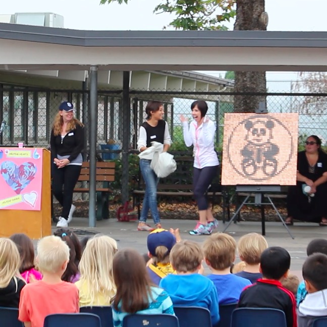 Presenting Panda Penny Mural as a thank you to Benchley Weinberger.